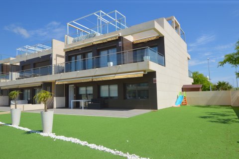 Casa adosada en venta en Torre de la Horadada, Alicante, España 4 dormitorios, 110 m2 No. 19322 - foto 1